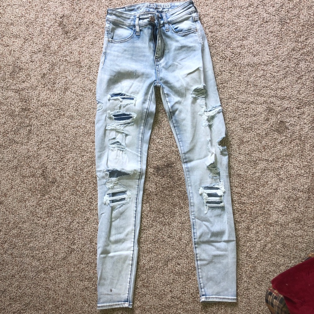 AE super stretch light washed ripped jeans